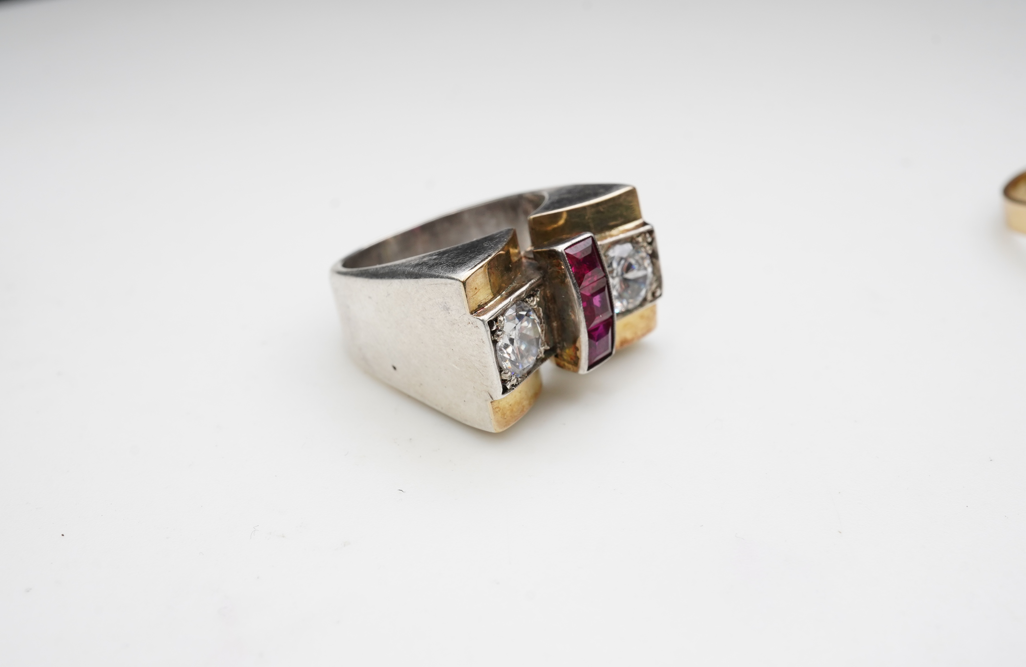 Two Retro synthetic stone and paste cocktail rings, 1940s